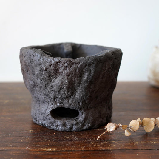 Rustic charcoal stove with Teapot