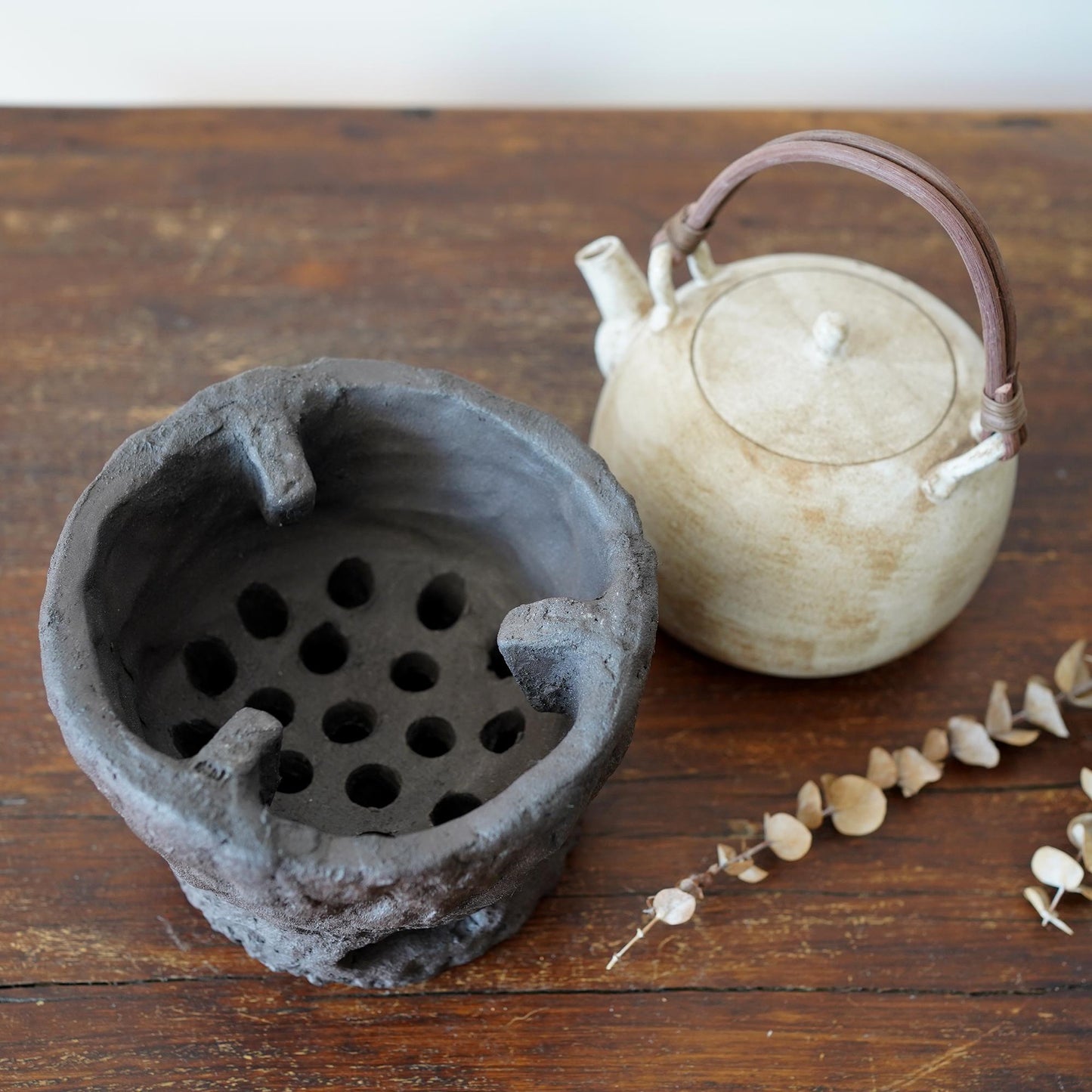 Rustic charcoal stove with Teapot