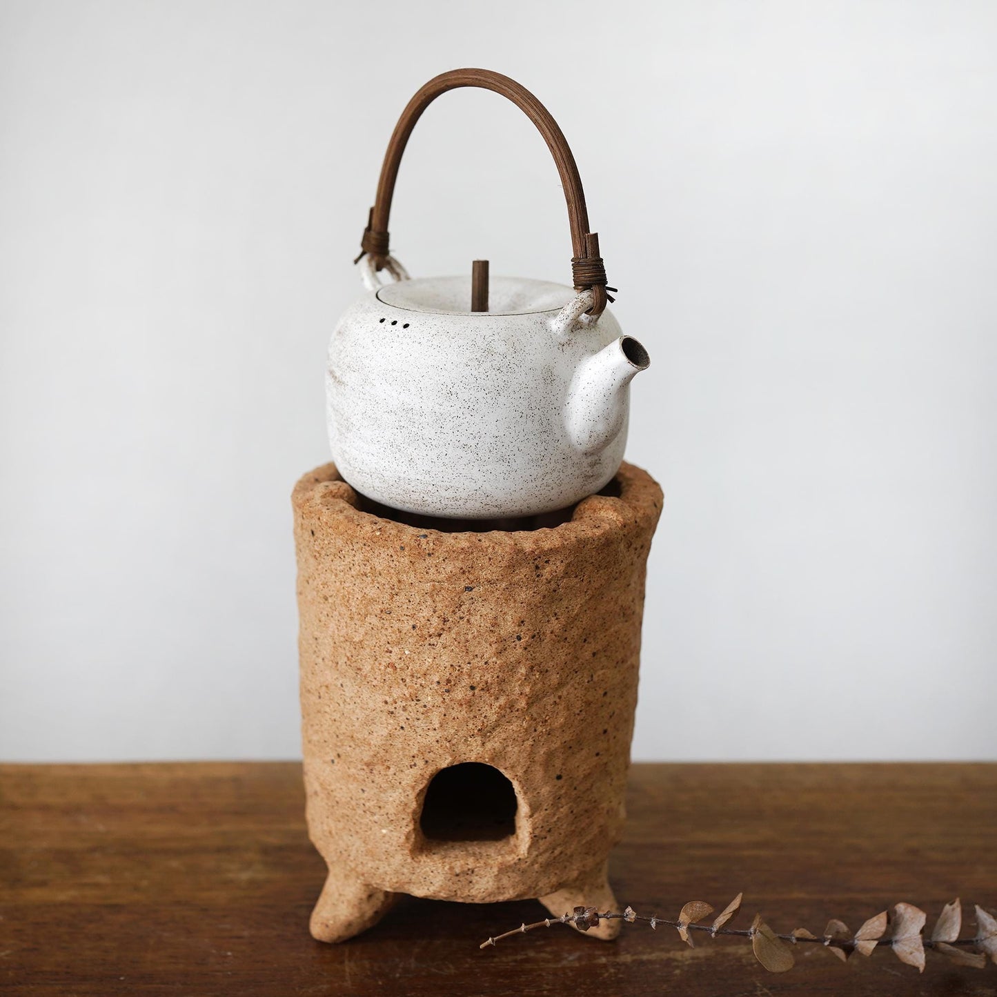 Rustic charcoal stove with Teapot