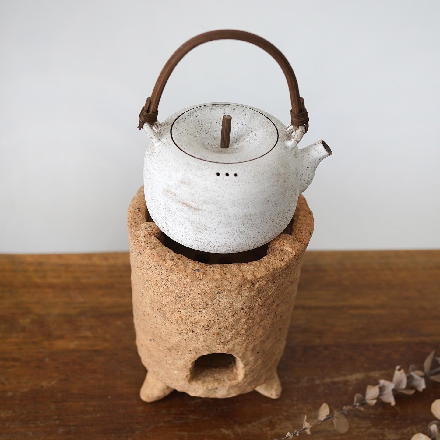 Rustic charcoal stove with Teapot